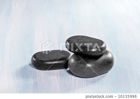 Zen stones on a wooden background 10135998