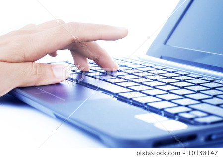 Typing on a Laptop Keyboard 10138147