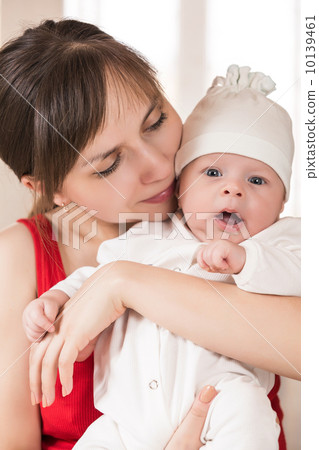 Cheerful young mother and her son Cheerful young mother and her son 10139461