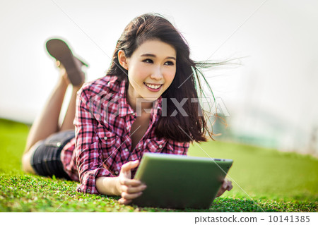 Girl with Tablet Girl with Tablet 10141385
