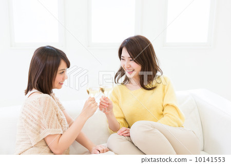 Two women drinking wine 10141553