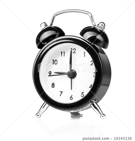 Black old style alarm clock isolated on white 10143138