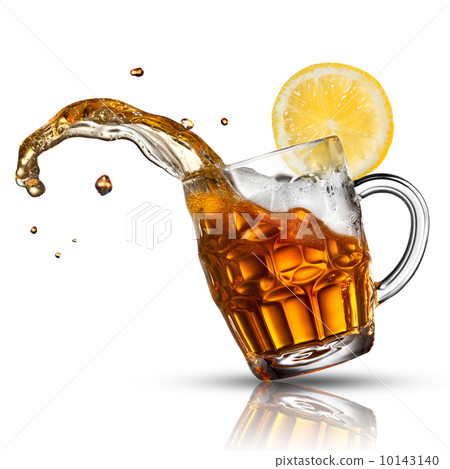 Beer splash in glass with lemon isolated on white 10143140