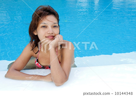 Young woman in the pool Young woman in the pool 10144348