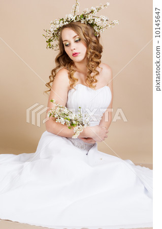 Beautiful bride with cherry wreath 10145647