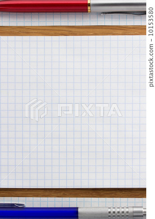 checked note paper on wood checked note paper on wood 10153580