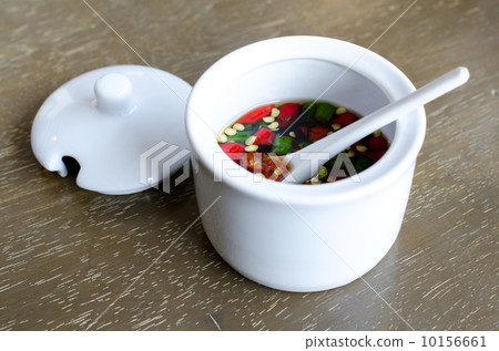 Fish Sauce Thailand in a white cup . Fish Sauce Thailand in a white cup . 10156661