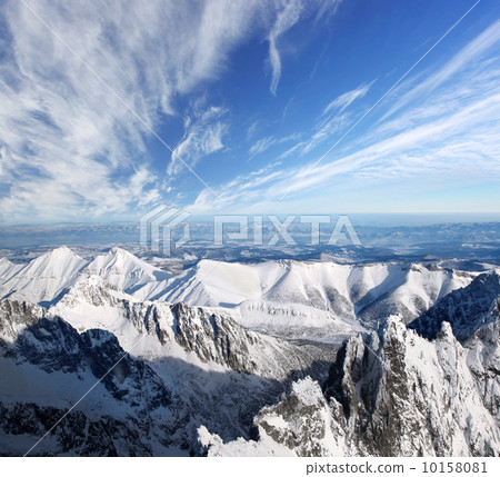 Amazing view of High winter Mountains against blue sky 10158081