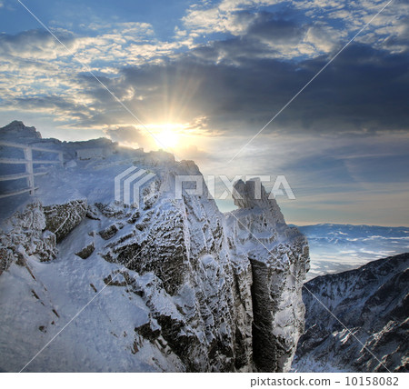 Amazing view of High winter Mountains against blue sky 10158082