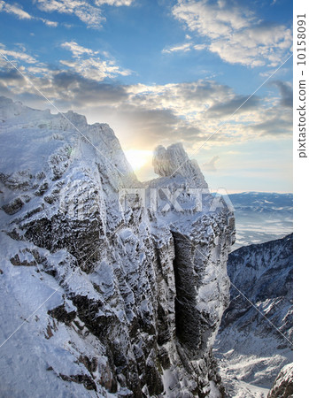 Amazing view of High winter Mountains against blue sky 10158091