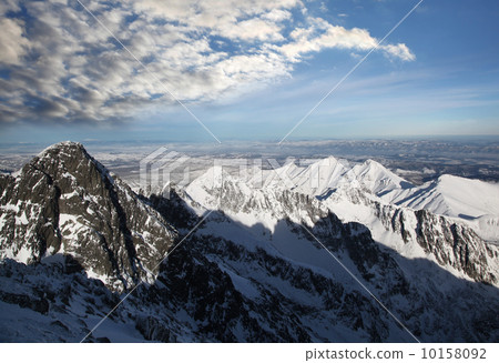 Amazing view of High winter Mountains against blue sky 10158092