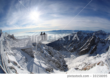 Amazing view of High winter Mountains against blue sky 10158095