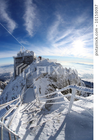 Amazing view of High winter Mountains against blue sky 10158097