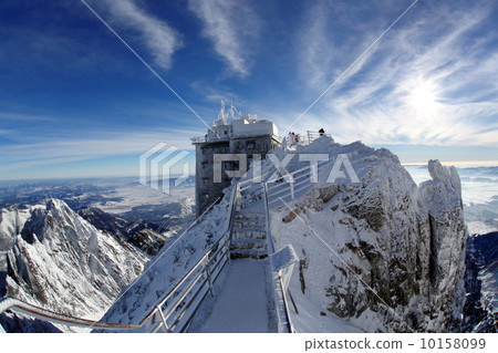 Amazing view of High winter Mountains against blue sky 10158099