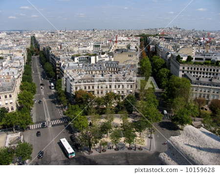 Distant view from Arc de Triomphe Paris Etoile Wagram Street (left) Osh street (right) Montmartre hill (right back) 10159628