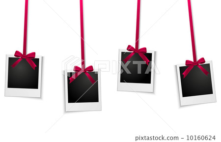 Frames hanging from a red ribbon 10160624