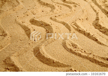 waves in the sand background 10161670