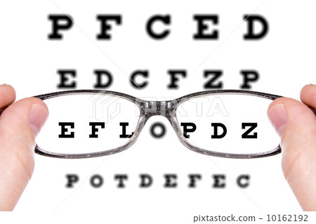 Sight test seen through eye glasses 10162192