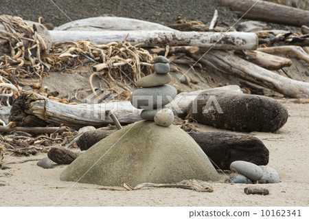 Stack of balanced rocks on remote California beach  10162341