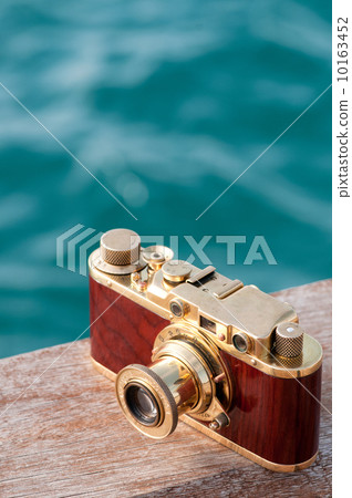 Still life with vintage camera 10163452