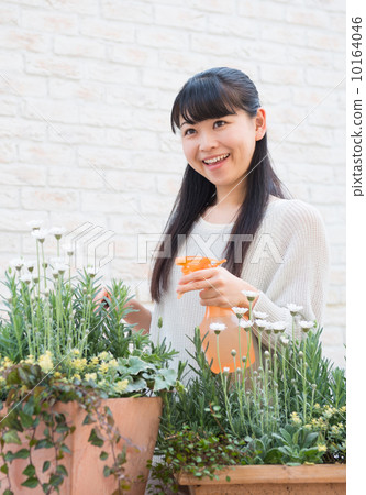 A girl wearing gardening A girl wearing gardening 10164046