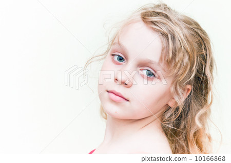 Portrait of a little blond girl above white background Portrait of a little blond girl above white background 10166868