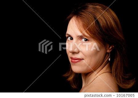 Slightly smiling young Caucasian woman 10167005