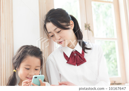 School girls and 5 year old girls 10167647