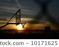 Basketball court against sunset 10171625