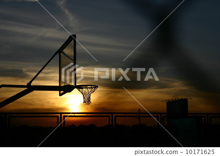 Basketball court against sunset 10171625