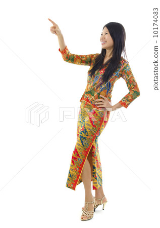 Asian female pointing Asian female pointing 10174083