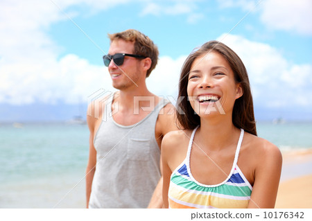 Happy couple on beach Happy couple on beach 10176342