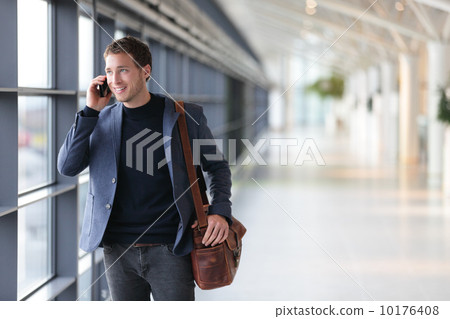 Urban business man talking on smart phone Urban business man talking on smart phone 10176408