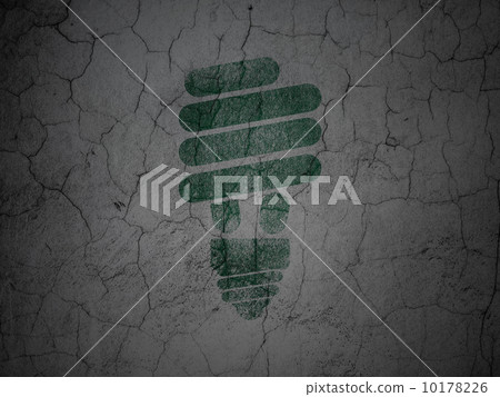 Business concept: Energy Saving Lamp on grunge wall background 10178226