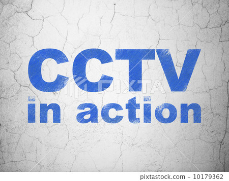 Protection concept: CCTV In action on wall background 10179362