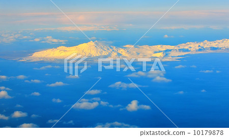 aerial view of mountains and clouds on top aerial view of mountains and clouds on top 10179878