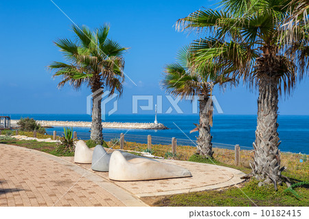 Sunbeds on promenade in Ashkelon, Israel. Sunbeds on promenade in Ashkelon, Israel. 10182415