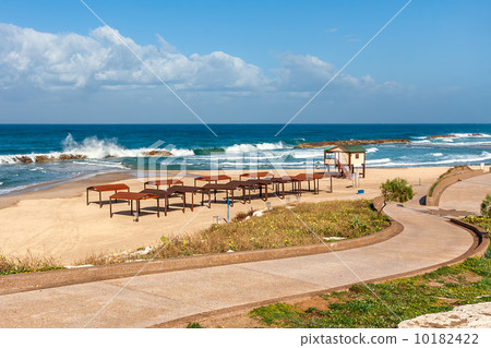 Promenade and empty beach on Mediterranean sea. 10182422