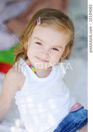 Adorable little girl portrait outdoors 10184062