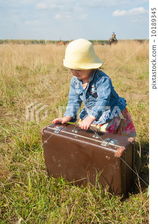 lonely girl with suitcase lonely girl with suitcase 10189345