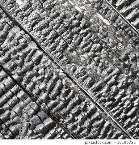 Wooden wall blackened after fire - texture Wooden wall blackened after fire - texture 10196758