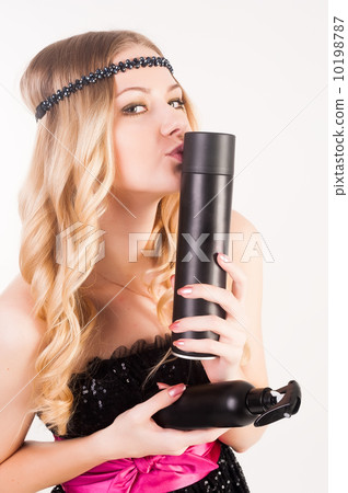 Attractive woman with hairspray 10198787