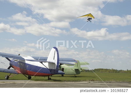 Paraglider over planes Paraglider over planes 10198827