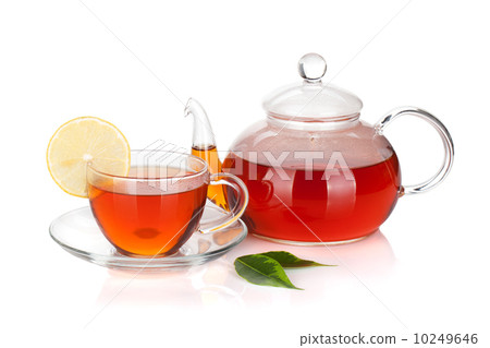 Glass teapot and cup of black tea with lemon slice 10249646