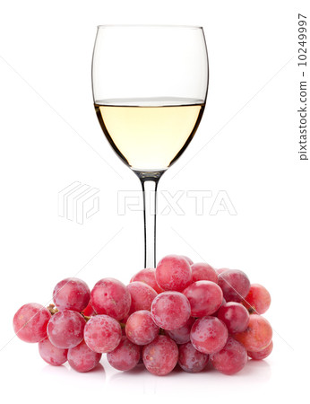 White wine in glass with red grape branch 10249997