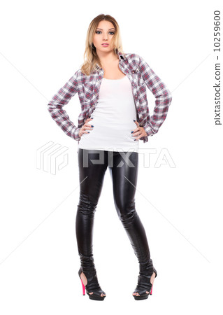 Young woman wearing checked shirt Young woman wearing checked shirt 10259600