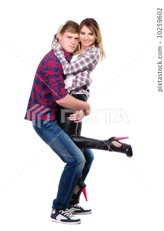 Cheerful pair posing in casual clothes 10259602