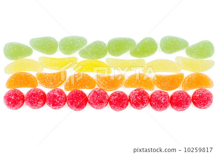 Lines made by pieces of marmalade isolated 10259817