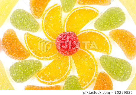 Flower made by pieces of marmalade isolated 10259825