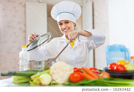cook in uniform works with vegetables cook in uniform works with vegetables 10263482